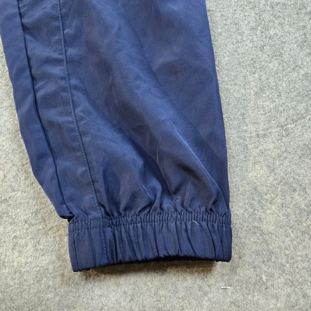 Nike‎ Track Pants Mens Medium Navy Blue Swoosh Logo Cuffed Joggers Sportswear